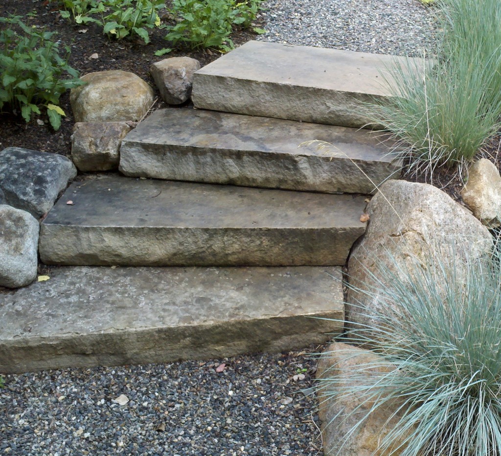 Solid stone riser and gravel path