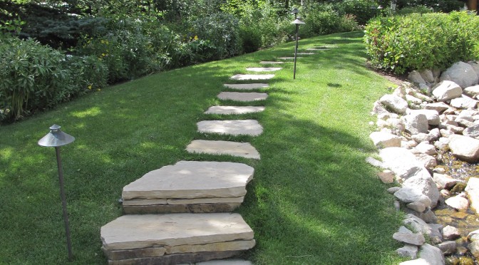 Flagstone pathway set in turf