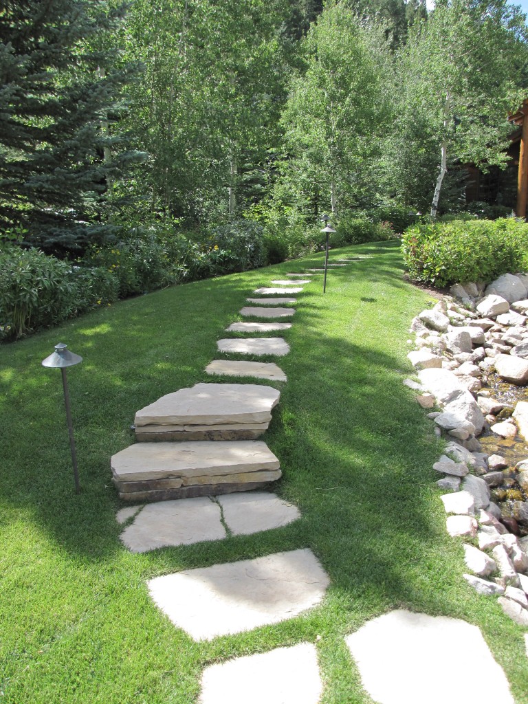 Flagstone pathway set in turf